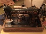 Vintage Singer Sewing Machine with red and gold decoration, just beautiful