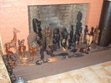 lots of carved wood african statues 