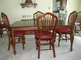 Pristine dining room set with one leaf and two arm chairs and four side chairs