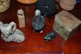 Large collection of soapstone carvings.