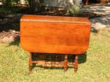 Refinished drop leaf oak table.