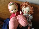 Vintage Raggedy Ann doll and other vintage dolls.