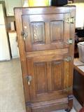 Refinished antique refrigerator.