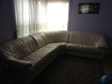 Great leather sectional with matching chair and ottoman.