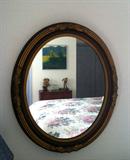 Oval Gilt and Mahogany Mirror