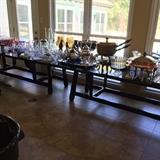 Two very long fabulous tables--for dining but leaves fold down to make long narrow tables