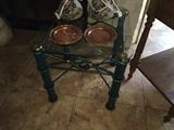 Handcrafted iron and glass table with brass accents