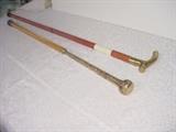 2 gold headed carved walking sticks