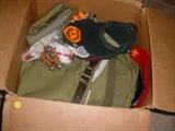 Boxes of old Boy Scout uniforms, clothes, hats, and accessories