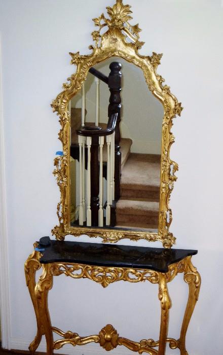 grand gilt antique mirror over entry table