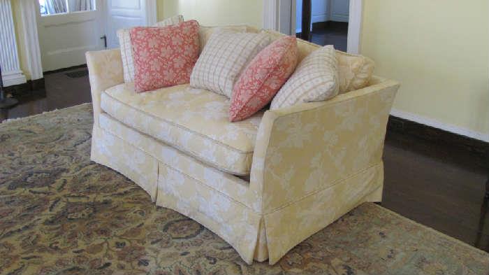 A matched pair of upholstered loveseats 
