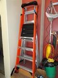 Werner Podium 10' Model PDIA04 and pictured behind Werner Folding Extension 25' Ladder Model MT26