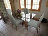 Dinette set with 6 chairs. 2 chairs not shown have arms.