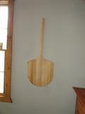 Pizza Oven wooden peel used as a wall decoration.