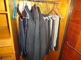 Suit jackets, ties and slacks. One jacket labeled "camel hair".