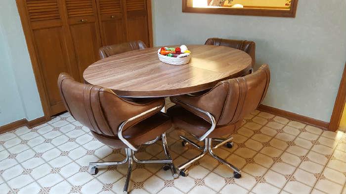 Kitchen table with four coaster chairs   $100