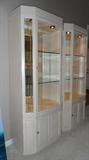 Drexel Heritage side by side lighted cabinets.