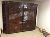 Prime quality mahogany cabinets. Four section easily movable. Einstein Moomjy purchased . New