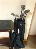 Golf Clubs & marble top console table