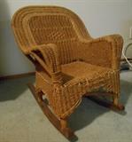 Antique child's wicker rocking chair