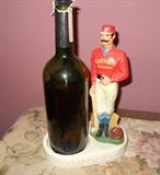 "Antique Bourbon" bottle holder with 1800's baseball player