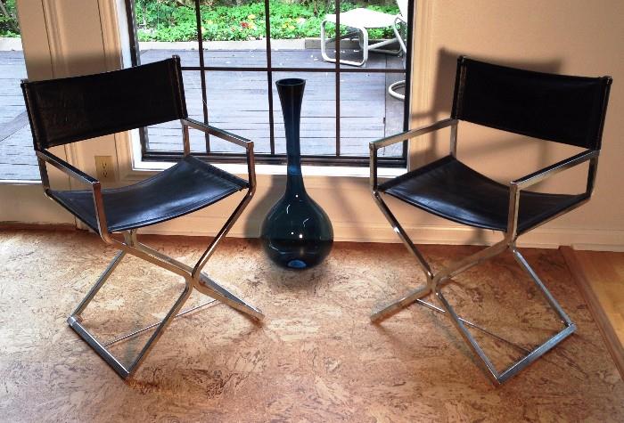 Chrome and nagahide 60's director's chairs . Smokey glass vase also vintage 60's                                                     
