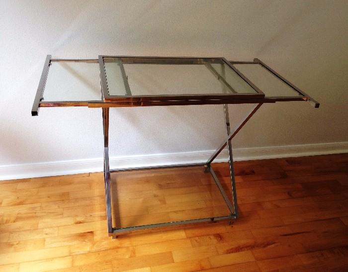 Incredible chrome and glass adjustable console by  Design Research . Mid century mod you can live with!