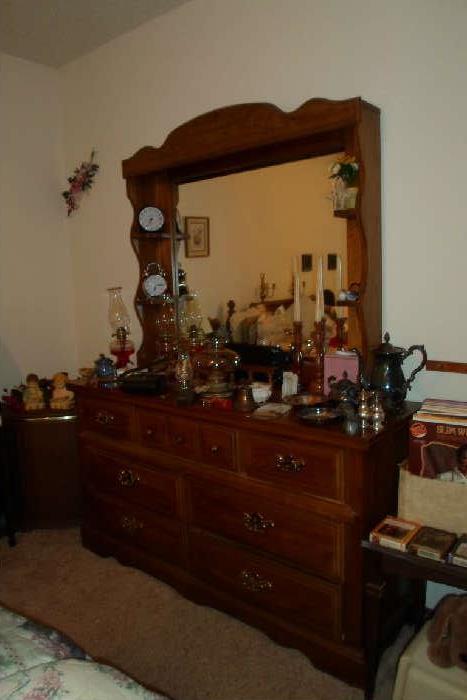 dresser w/mirror, have queen bed with wooden headboard