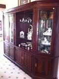 Thomasville Mahogany Collection 4-Sectioned Display Cabinet. Three sections have glass front doors and one is open. Lots of great storage for your collectibles!