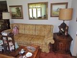 Sofa with matching love seat, coffee table, lamps, art, mirror