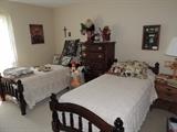 twin beds and bedding, dresser