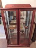 cherry glass curio with beveled glass