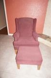 rose colored wing back chair and ottoman