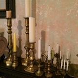4-5 dozen brass candlesticks
