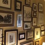 Some of the many black & white framed pen & ink art