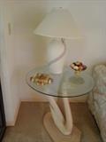 Swan lamp table has a matching coffee table