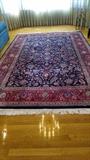 Fringed oriental carpet; mesures 9' 6" x 8' - 