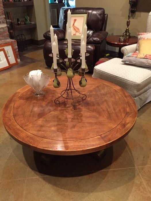 THIS OAK COFFEE TABLE UNLATCHES AND RAISES TO BECOME A GAME TABLE.