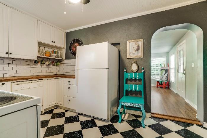 Refrigerator, and one-of-a-kind chairs.