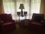 2 beautiful arm chairs with our little side table and lamp 