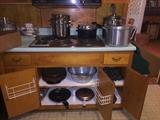 A large assortment of cookware and bakeware 