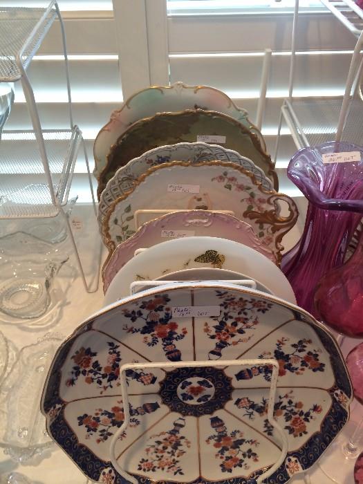 Variety of porcelain and hand-painted plates