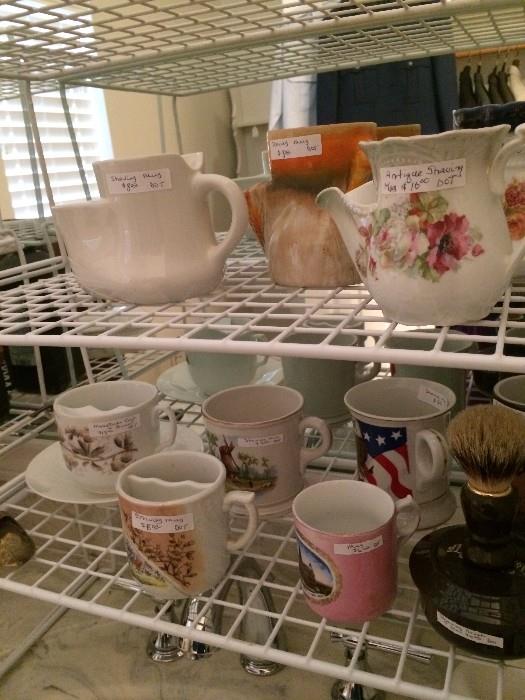 Antique shaving mugs and ceramic mustache cup