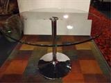CHROME AND GLASS PEDESTAL DINING TABLE