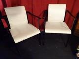PAIR 1970's METAL AND WHITE VINYL ARMCHAIRS, BLACK FINISH METAL FRAMES AND WOVEN WHITE VINYL UPHOLSTERY