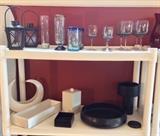Lanterns, stemware including Holmegaard wine glasses, black & white pottery including white crescent vase by Toyo & large black studio pottery bowl by Paddy McNeely.