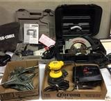 Porter Cable double bayonet saw (Model 7549), Porter Cable 7 1/4" heavy duty circular saw (Model 743), DeWalt random orbit palm sander (DW421), Craftsman sabre saw, Craftsman corner clamps