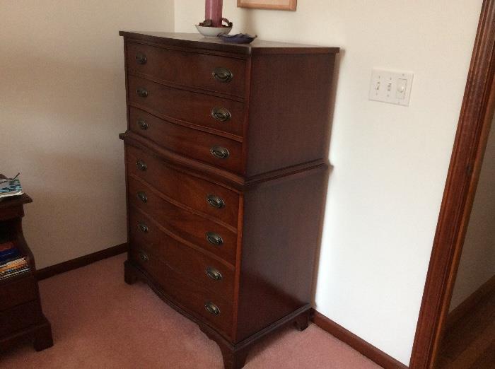 This lovely chest of drawers has 7 drawers. The name Dixie is inside the drawer. 49 1/2" high, 34 1/2" wide, 19" deep.