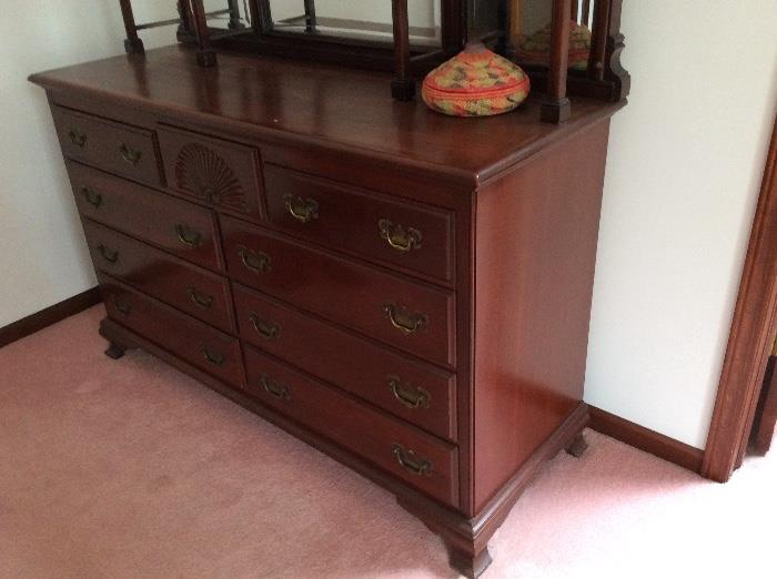 This beautiful hutch is solid cherry, made by Kling. 34" high, 55 1/2" wide and 20 1/2" deep.