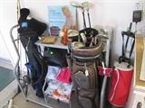 Golf storage rack, clubs, Arnold Palmer book/record, golf bags